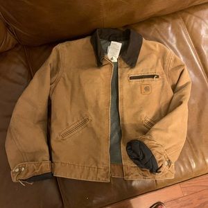 worn carhartt jacket